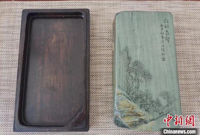 圖為盧保勝為提升洮硯文化內(nèi)涵，制作“一硯一銘、一盒一拓”成品展示?！堟?攝