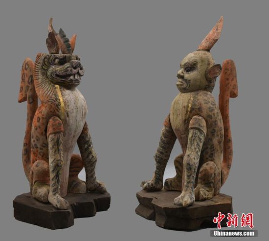 圖為慕容智墓出土鎮(zhèn)墓獸。 中新社發(fā) 甘肅省文物局 供圖